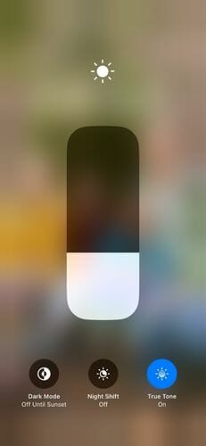 Press and hold the brightness icon